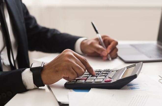 Finance professionals reviewing business performance